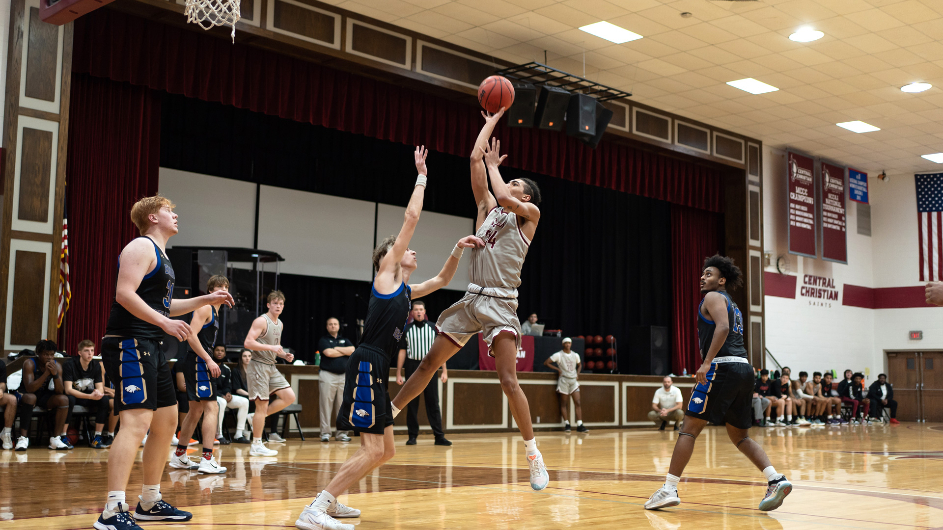 CCCB sophomore Trey Koester scored eight points in the Saints' 90-72 loss to Great Lakes Christian College on Saturday.