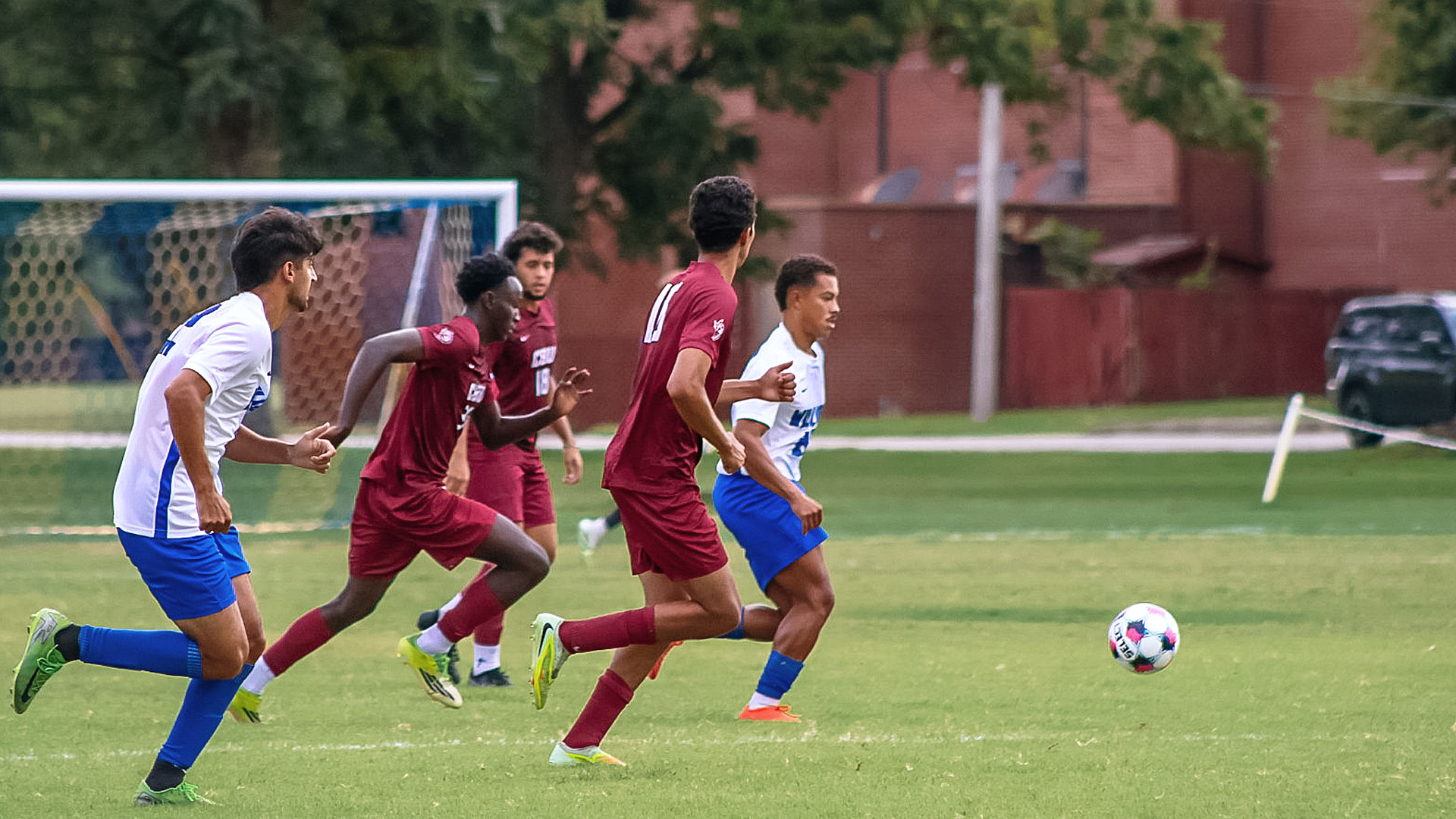 Several CBU players looks to regain possession during the Saints' 8-0 loss at Williams Baptist University on Wednesday.